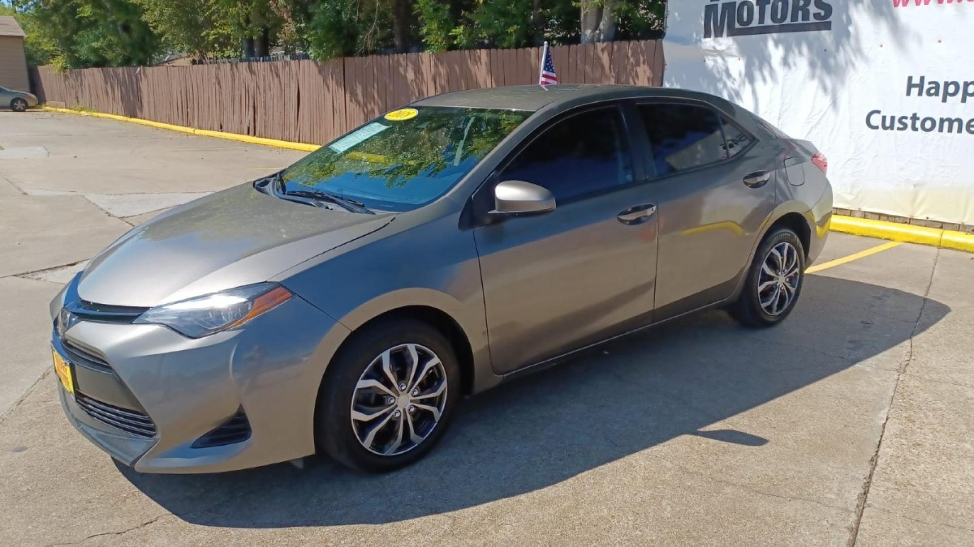 2018 Brown Toyota Corolla SE 6M (5YFBURHE7JP) with an 1.8L L4 DOHC 16V engine, 6M transmission, located at 16710 Clay Rd., Houston, TX, 77084, (281) 859-7900, 29.834864, -95.656166 - Low Down. Low Payments. - Photo#2