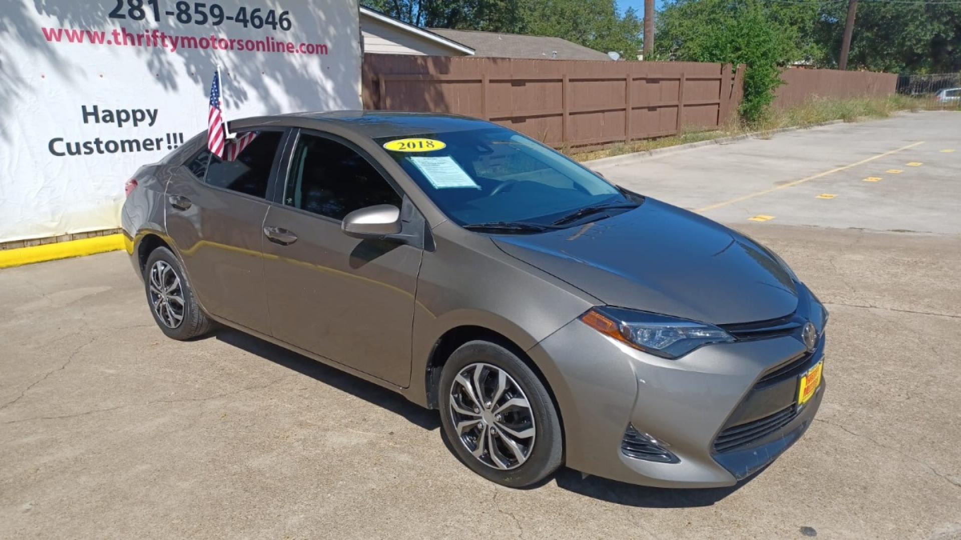 2018 Brown Toyota Corolla SE 6M (5YFBURHE7JP) with an 1.8L L4 DOHC 16V engine, 6M transmission, located at 16710 Clay Rd., Houston, TX, 77084, (281) 859-7900, 29.834864, -95.656166 - Low Down. Low Payments. - Photo#3