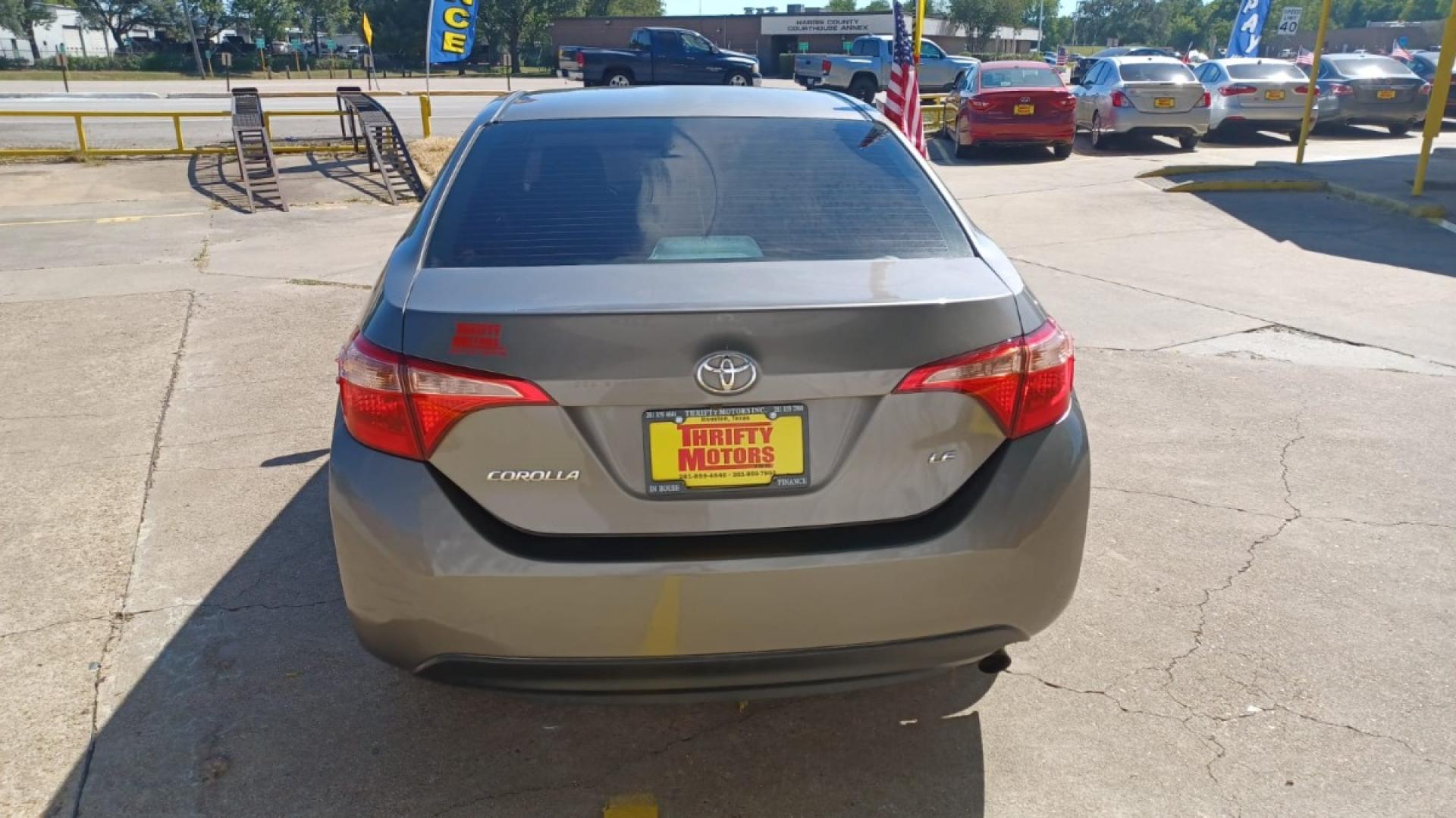 2018 Brown Toyota Corolla SE 6M (5YFBURHE7JP) with an 1.8L L4 DOHC 16V engine, 6M transmission, located at 16710 Clay Rd., Houston, TX, 77084, (281) 859-7900, 29.834864, -95.656166 - Low Down. Low Payments. - Photo#5