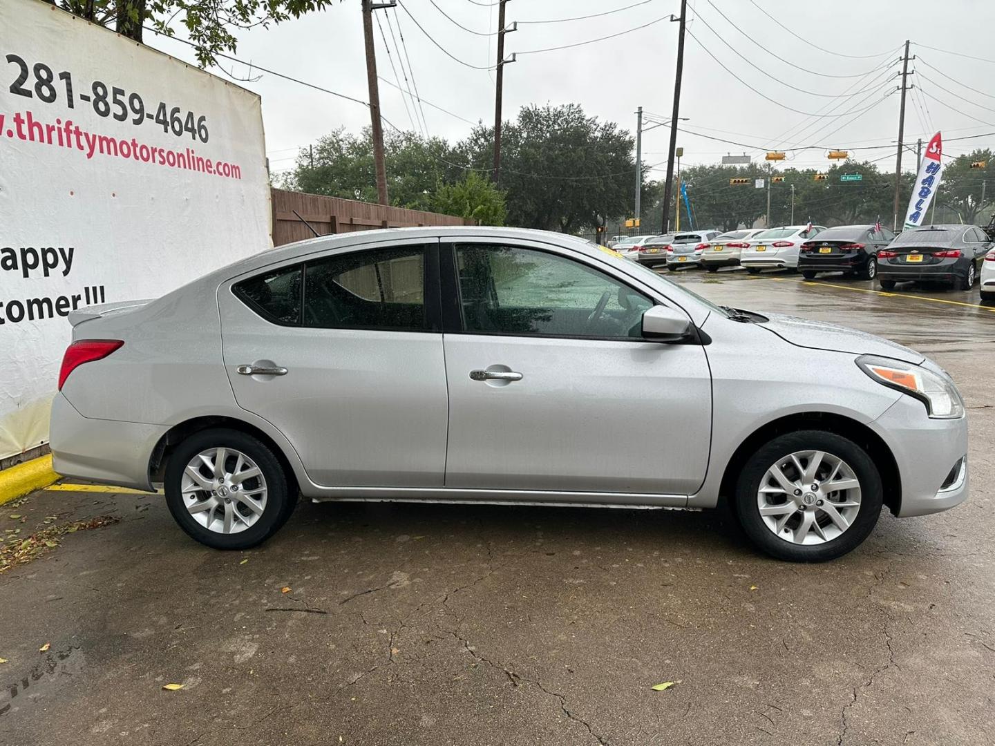 2018 Silver Nissan Versa 1.6 SL Sedan (3N1CN7AP4JL) with an 1.6L L4 DOHC 16V engine, CVT transmission, located at 16710 Clay Rd., Houston, TX, 77084, (281) 859-7900, 29.834864, -95.656166 - Low Down. Low Payments. - Photo#4