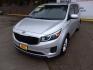 2016 Silver Kia Sedona LX (KNDMB5C12G6) with an 3.3L V6 DOHC 24V engine, 6-Speed Automatic transmission, located at 16710 Clay Rd., Houston, TX, 77084, (281) 859-7900, 29.834864, -95.656166 - Low Down. Low Payments. - Photo#2