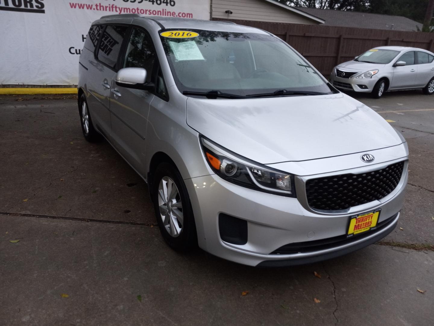 2016 Silver Kia Sedona LX (KNDMB5C12G6) with an 3.3L V6 DOHC 24V engine, 6-Speed Automatic transmission, located at 16710 Clay Rd., Houston, TX, 77084, (281) 859-7900, 29.834864, -95.656166 - Low Down. Low Payments. - Photo#3