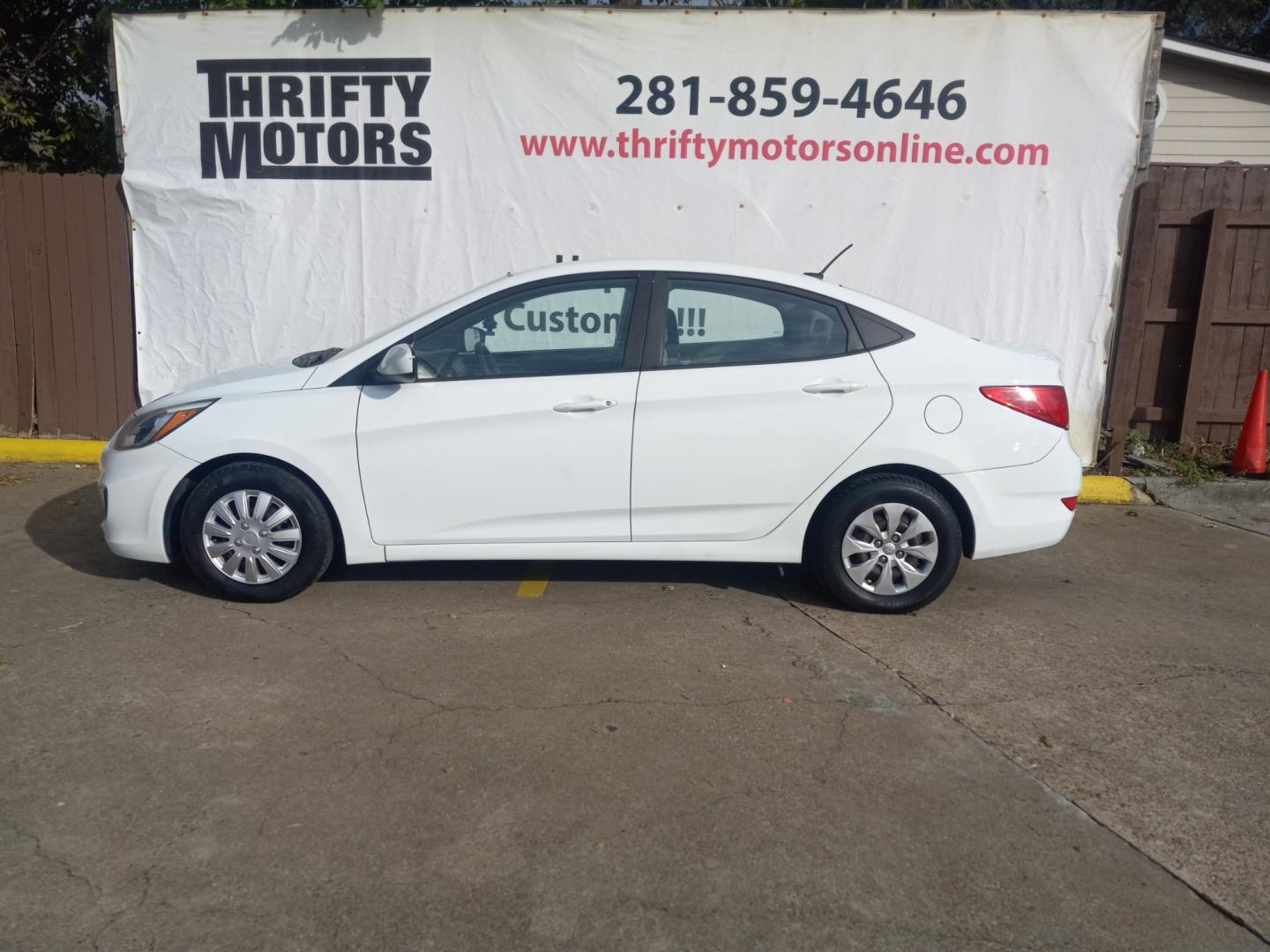 2017 White Hyundai Accent SE 4-Door 6M (KMHCT4AE5HU) with an 1.6L L4 DOHC 16V engine, 6M transmission, located at 16710 Clay Rd., Houston, TX, 77084, (281) 859-7900, 29.834864, -95.656166 - Low Down. Low Payments. - Photo#0