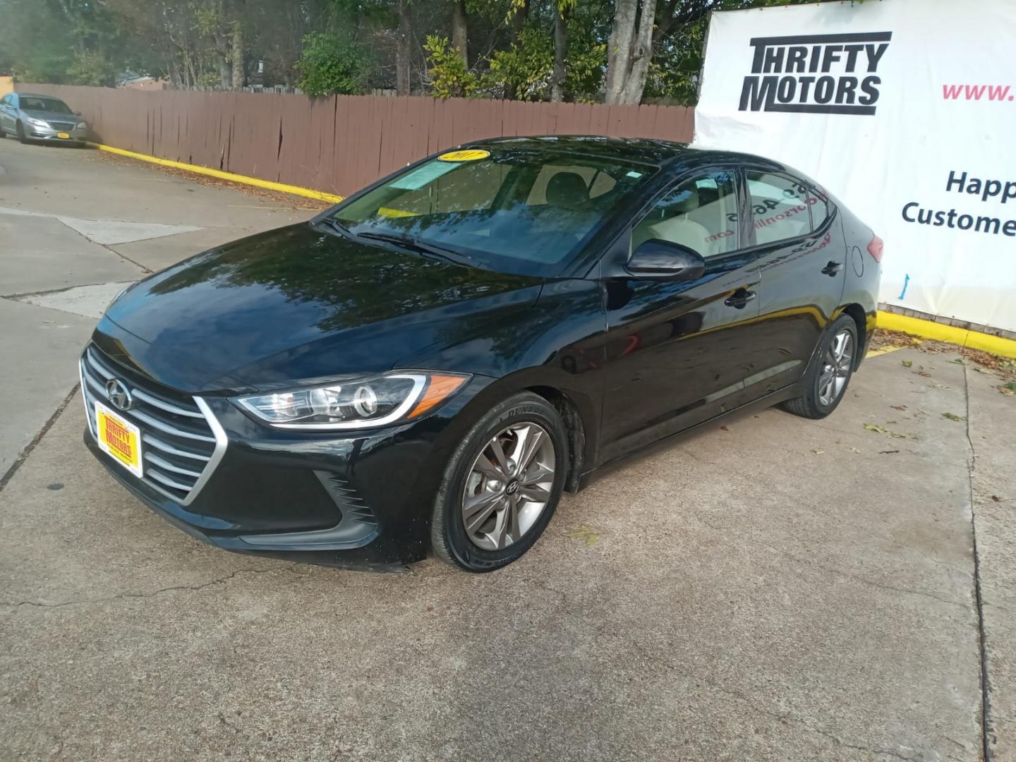 2017 BLACK Hyundai Elantra Limited (5NPD84LF4HH) with an 1.8L L4 DOHC 16V engine, 6A transmission, located at 16710 Clay Rd., Houston, TX, 77084, (281) 859-7900, 29.834864, -95.656166 - Low Down. Low Payments. - Photo#2