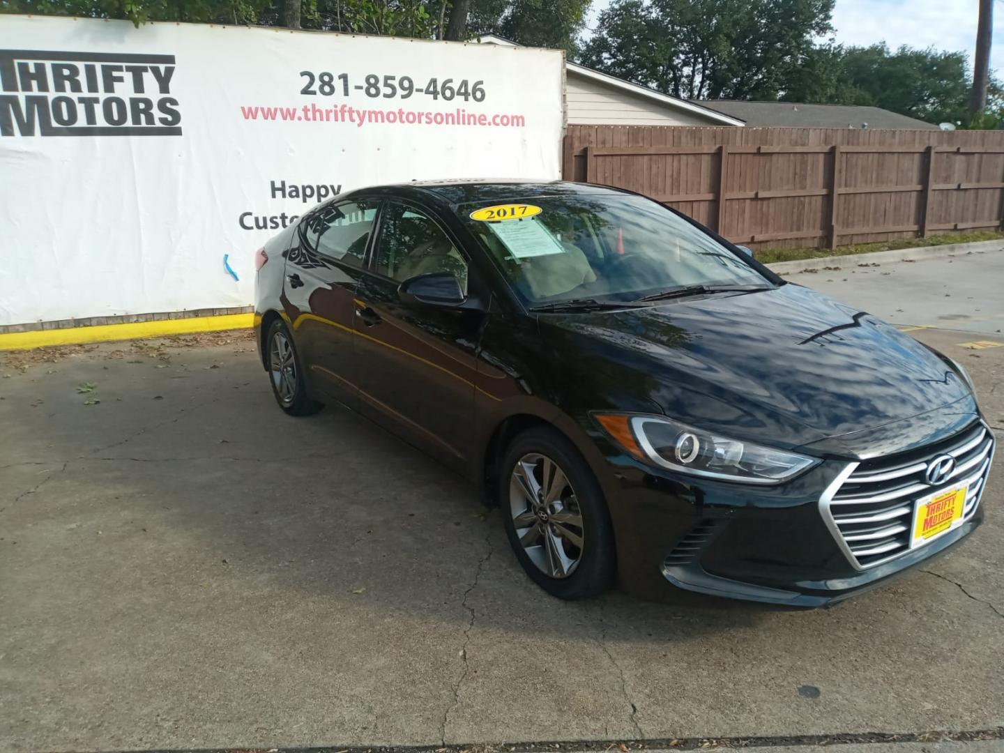 2017 BLACK Hyundai Elantra Limited (5NPD84LF4HH) with an 1.8L L4 DOHC 16V engine, 6A transmission, located at 16710 Clay Rd., Houston, TX, 77084, (281) 859-7900, 29.834864, -95.656166 - Low Down. Low Payments. - Photo#3