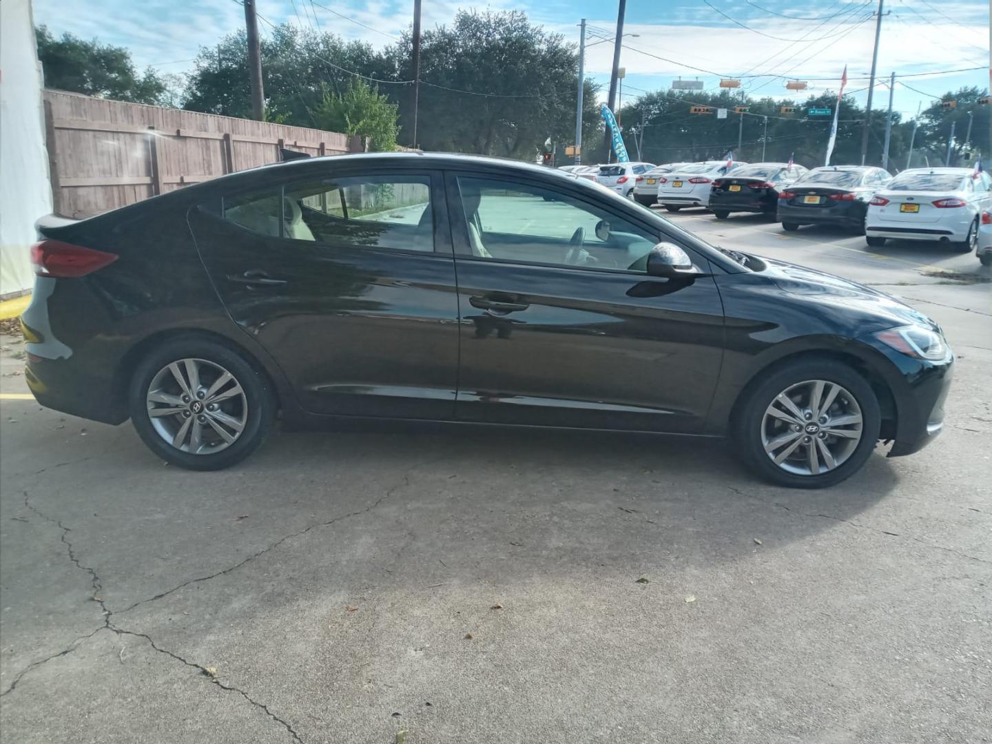 2017 BLACK Hyundai Elantra Limited (5NPD84LF4HH) with an 1.8L L4 DOHC 16V engine, 6A transmission, located at 16710 Clay Rd., Houston, TX, 77084, (281) 859-7900, 29.834864, -95.656166 - Low Down. Low Payments. - Photo#4