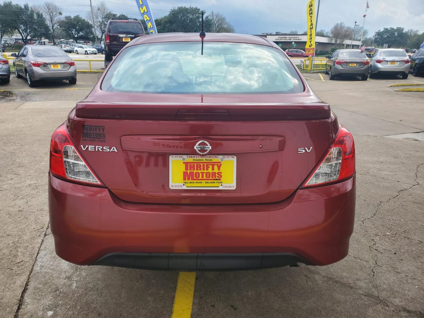 2018 Red Nissan Versa 1.6 SL Sedan (3N1CN7AP2JL) with an 1.6L L4 DOHC 16V engine, CVT transmission, located at 16710 Clay Rd., Houston, TX, 77084, (281) 859-7900, 29.834864, -95.656166 - Low Down. Low Payments. - Photo#4