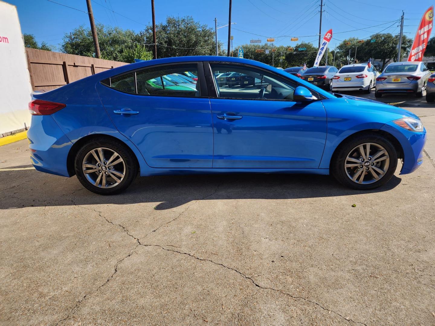 2017 Blue Hyundai Elantra Limited (5NPD84LF2HH) with an 1.8L L4 DOHC 16V engine, 6A transmission, located at 16710 Clay Rd., Houston, TX, 77084, (281) 859-7900, 29.834864, -95.656166 - Low Dow. Low Payments. - Photo#4