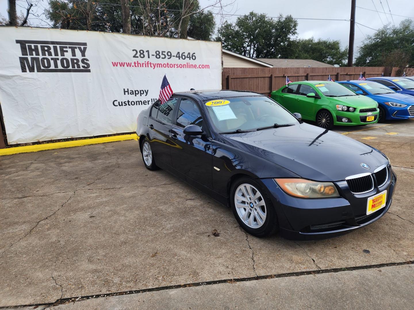 2007 Blue BMW 3-Series 328i (WBAVA33557K) with an 3.0L L6 DOHC 24V engine, located at 16710 Clay Rd., Houston, TX, 77084, (281) 859-7900, 29.834864, -95.656166 - Cash. - Photo#3