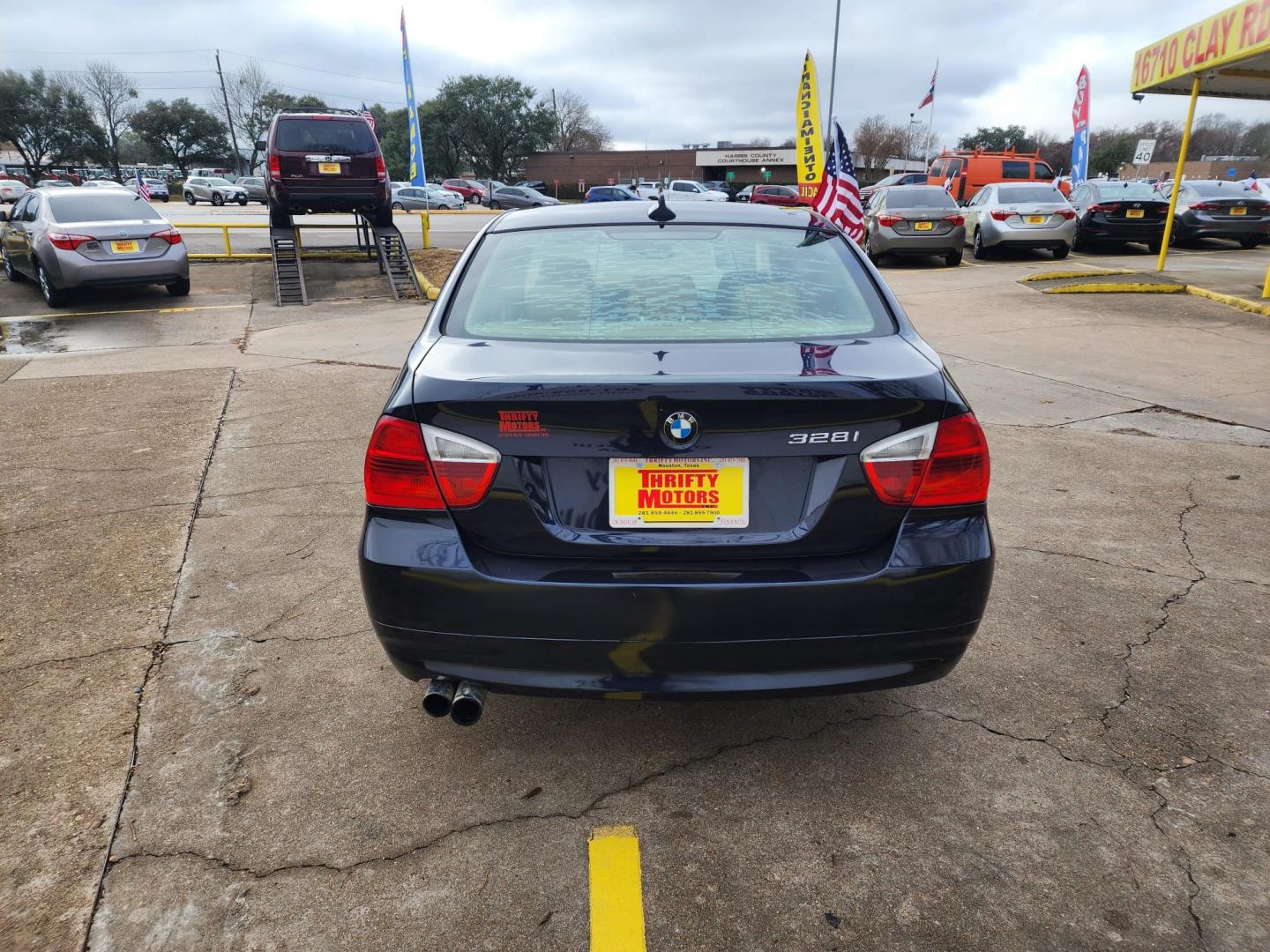 2007 Blue BMW 3-Series 328i (WBAVA33557K) with an 3.0L L6 DOHC 24V engine, located at 16710 Clay Rd., Houston, TX, 77084, (281) 859-7900, 29.834864, -95.656166 - Cash. - Photo#4