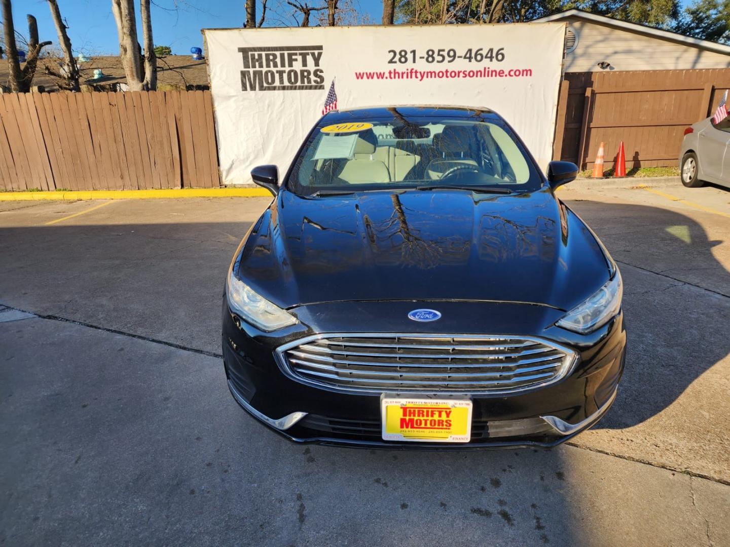 2019 Black Ford Fusion SE (3FA6P0H77KR) with an 2.5L L4 DOHC 16V engine, 6A transmission, located at 16710 Clay Rd., Houston, TX, 77084, (281) 859-7900, 29.834864, -95.656166 - Low Down. Low Payments. - Photo#1