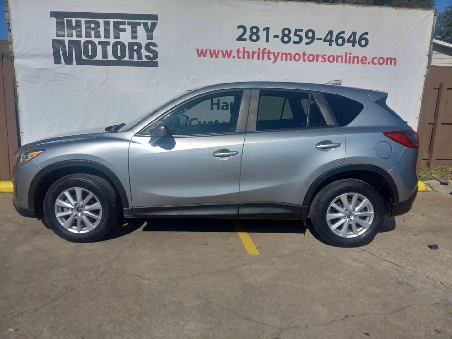 2014 Gray Mazda CX-5 Touring (JM3KE2CY9E0) with an 2.5L L4 DOHC 16V engine, 6-Speed Automatic transmission, located at 16710 Clay Rd., Houston, TX, 77084, (281) 859-7900, 29.834864, -95.656166 - Low Down. Low Payments. - Photo#0