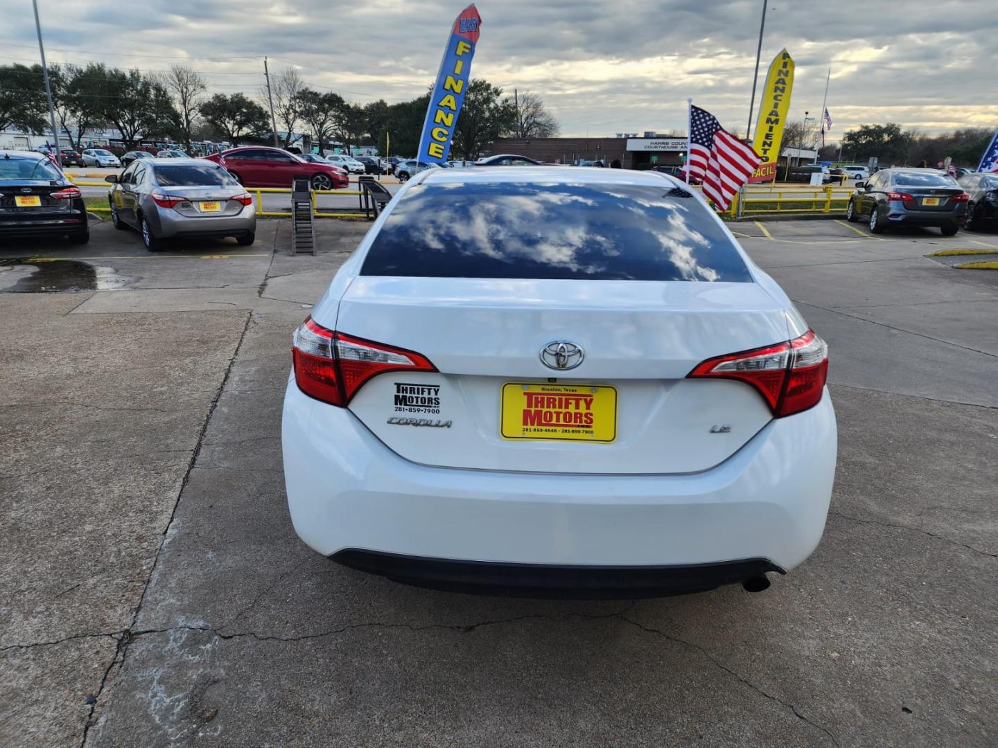 2015 White Toyota Corolla L 4-Speed AT (5YFBURHEXFP) with an 1.8L L4 DOHC 16V engine, 4-Speed Automatic transmission, located at 16710 Clay Rd., Houston, TX, 77084, (281) 859-7900, 29.834864, -95.656166 - Low Down. Low Payments. - Photo#5