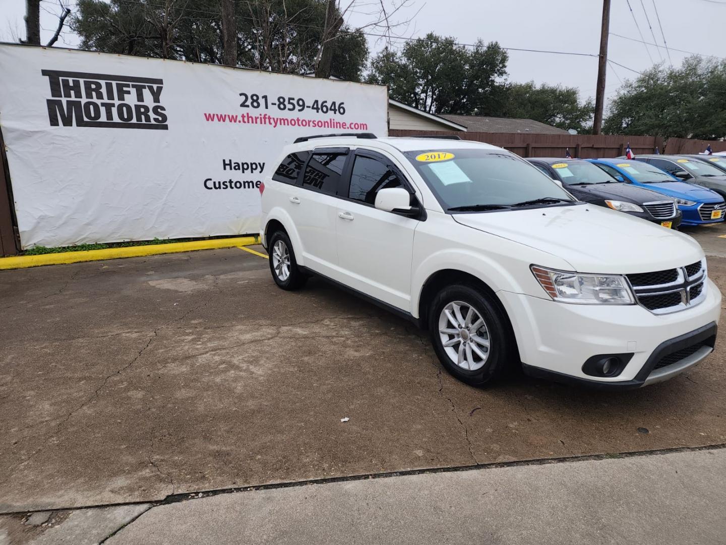 2017 White Dodge Journey SXT (3C4PDCBB5HT) with an 2.4L L6 DOHC 16V engine, 4A transmission, located at 16710 Clay Rd., Houston, TX, 77084, (281) 859-7900, 29.834864, -95.656166 - Low Down. Low Payments. - Photo#2