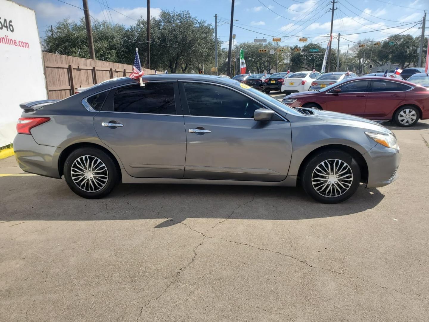 2017 Gray Nissan Altima 2.5 S (1N4AL3AP9HC) with an 2.5L L4 DOHC 16V engine, CVT transmission, located at 16710 Clay Rd., Houston, TX, 77084, (281) 859-7900, 29.834864, -95.656166 - Low Down. Low Payments. - Photo#4