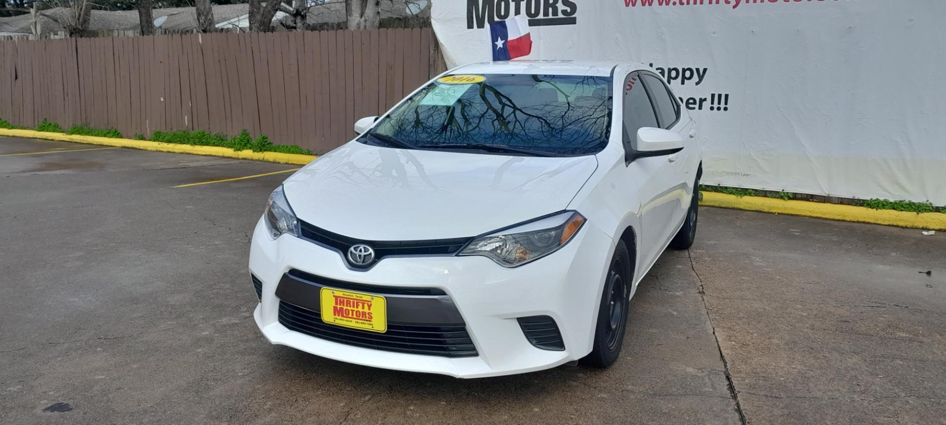 2016 White Toyota Corolla L 4-Speed AT (2T1BURHE7GC) with an 1.8L L4 DOHC 16V engine, 4A transmission, located at 16710 Clay Rd., Houston, TX, 77084, (281) 859-7900, 29.834864, -95.656166 - Low Down. Low Payments. - Photo#2