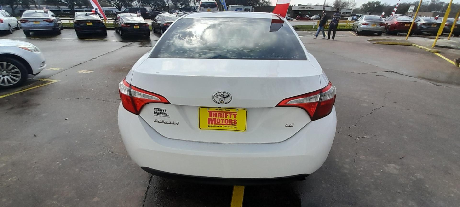 2016 White Toyota Corolla L 4-Speed AT (2T1BURHE7GC) with an 1.8L L4 DOHC 16V engine, 4A transmission, located at 16710 Clay Rd., Houston, TX, 77084, (281) 859-7900, 29.834864, -95.656166 - Low Down. Low Payments. - Photo#5