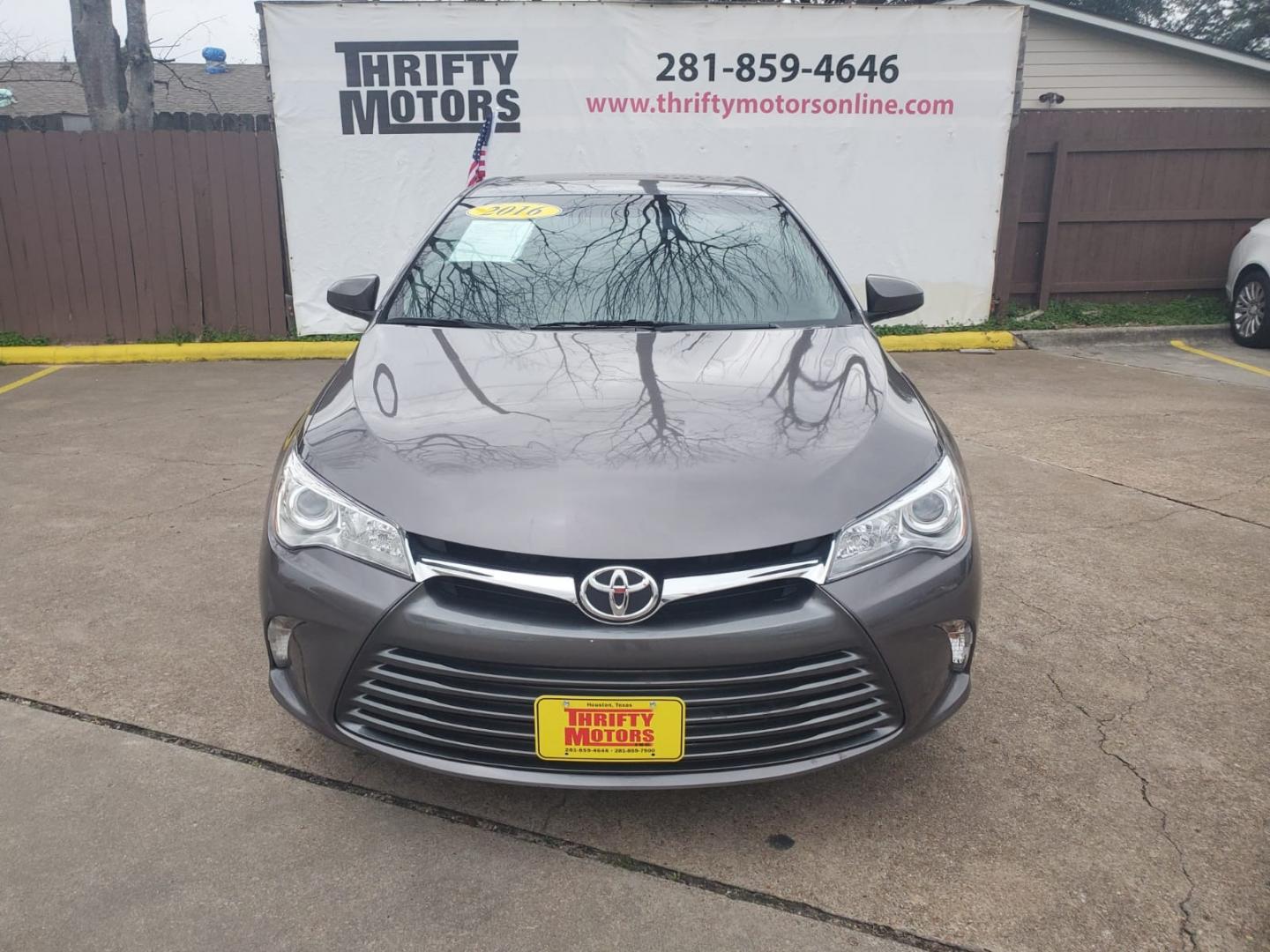 2016 Gray Toyota Camry SE (4T1BF1FK5GU) with an 2.5L L4 DOHC 16V engine, 6-Speed Automatic transmission, located at 16710 Clay Rd., Houston, TX, 77084, (281) 859-7900, 29.834864, -95.656166 - Low Down. Low Payments. - Photo#1