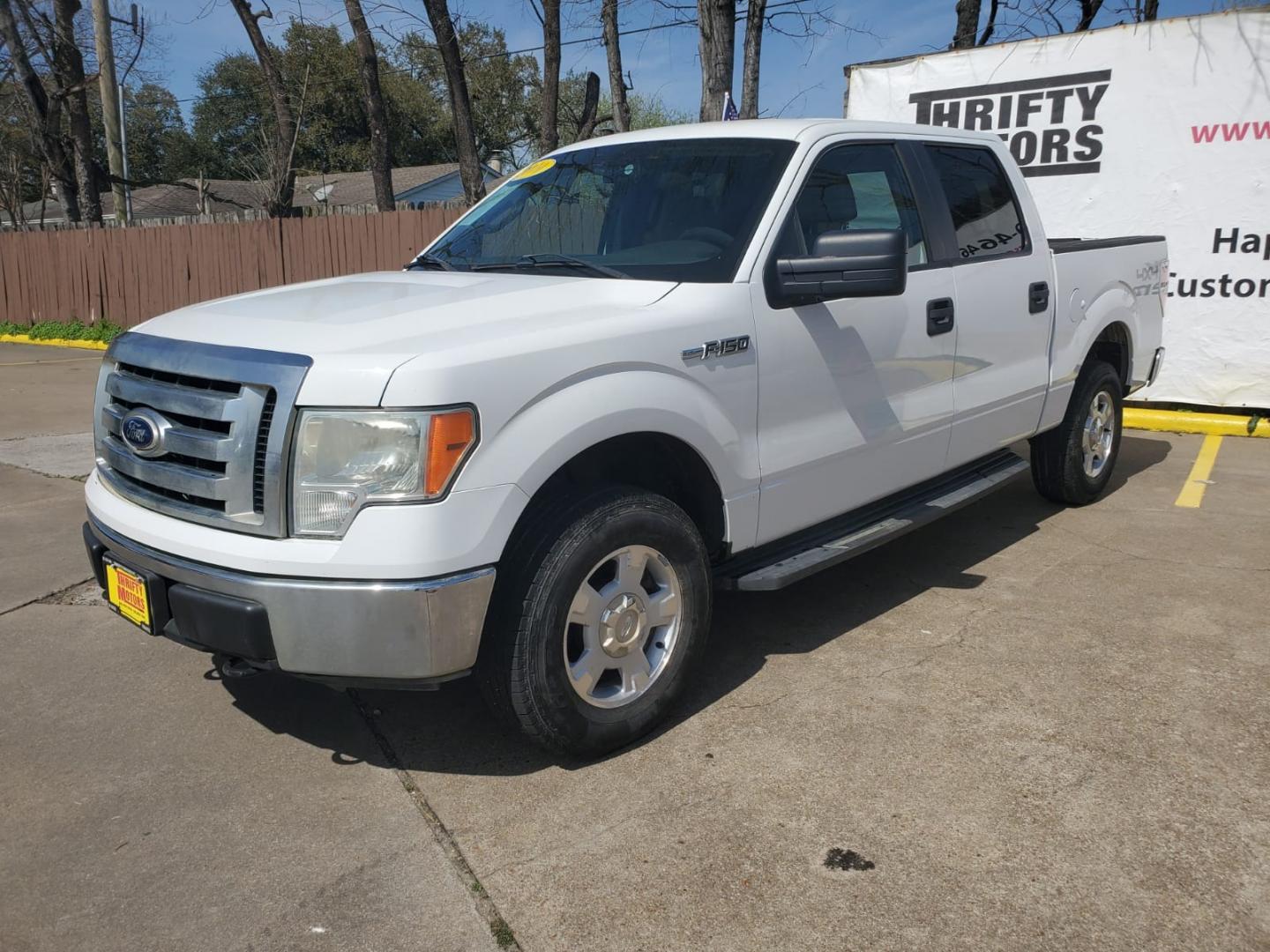 2010 White Ford F-150 Lariat SuperCrew 5.5-ft. Bed 4WD (1FTEW1E85AF) with an 4.6L V8 SOHC 24V engine, 4-Speed Automatic transmission, located at 16710 Clay Rd., Houston, TX, 77084, (281) 859-7900, 29.834864, -95.656166 - Low Down. Low Payments. - Photo#2