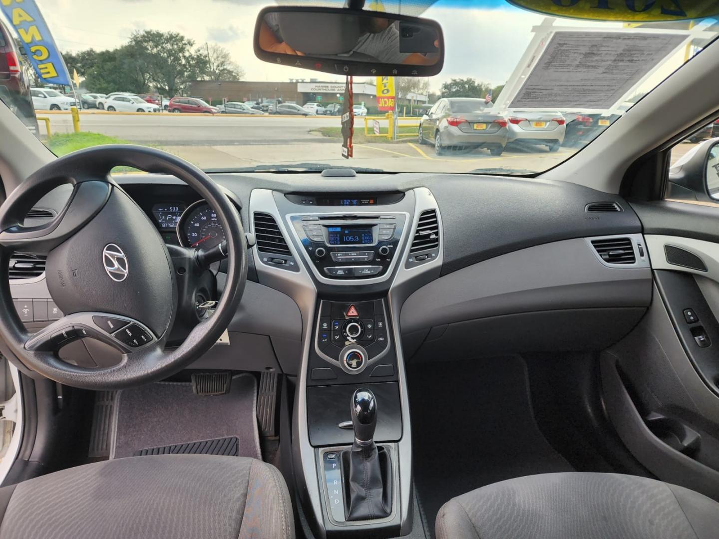 2016 White Hyundai Elantra (5NPDH4AE1GH) with an 1.8L I4 1.8L I4 engine, Automatic 6-Speed transmission, located at 16710 Clay Rd., Houston, TX, 77084, (281) 859-7900, 29.834864, -95.656166 - Low Down. Low payments - Photo#8