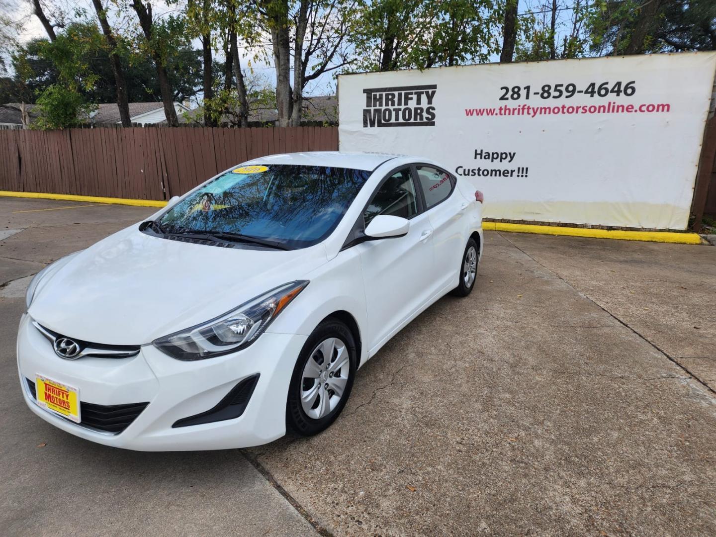 2016 White Hyundai Elantra (5NPDH4AE1GH) with an 1.8L I4 1.8L I4 engine, Automatic 6-Speed transmission, located at 16710 Clay Rd., Houston, TX, 77084, (281) 859-7900, 29.834864, -95.656166 - Low Down. Low payments - Photo#2