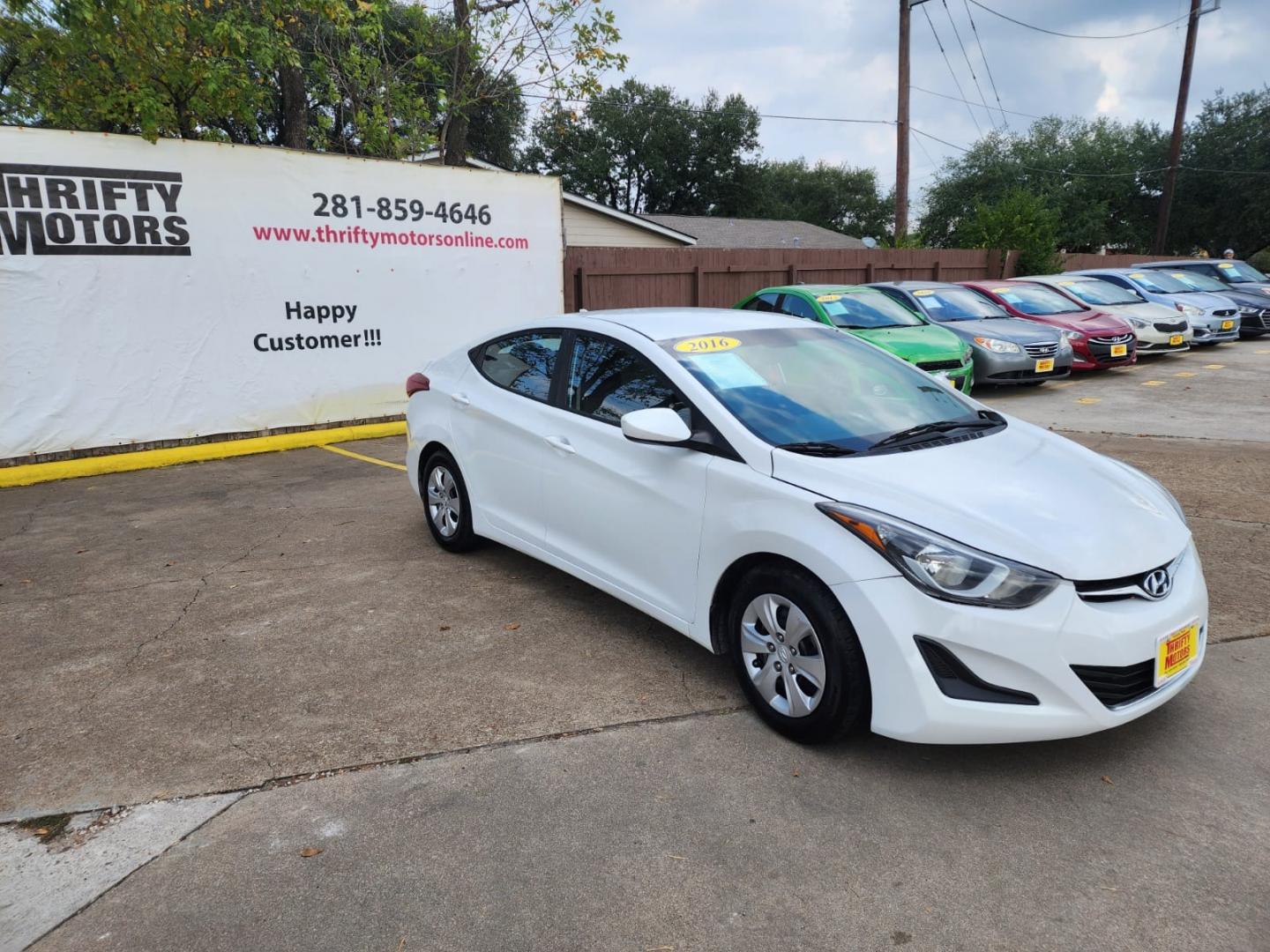 2016 White Hyundai Elantra (5NPDH4AE1GH) with an 1.8L I4 1.8L I4 engine, Automatic 6-Speed transmission, located at 16710 Clay Rd., Houston, TX, 77084, (281) 859-7900, 29.834864, -95.656166 - Low Down. Low payments - Photo#3