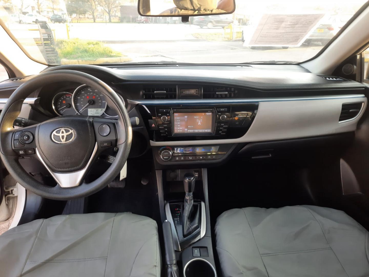 2015 White Toyota Corolla L 4-Speed AT (2T1BURHE2FC) with an 1.8L L4 DOHC 16V engine, 4-Speed Automatic transmission, located at 16710 Clay Rd., Houston, TX, 77084, (281) 859-7900, 29.834864, -95.656166 - Low Down. Low Payments. - Photo#2