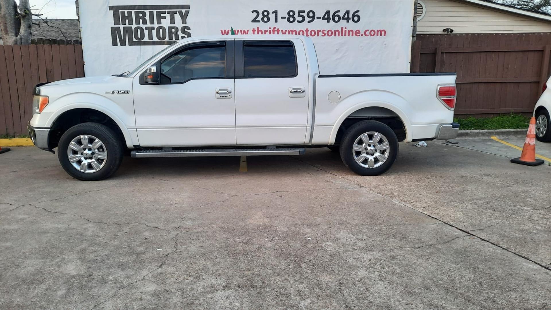 2010 White Ford F-150 Lariat SuperCrew 5.5-ft. Bed 2WD (1FTFW1CV0AK) with an 5.4L V8 SOHC 24V FFV engine, 4-Speed Automatic transmission, located at 16710 Clay Rd., Houston, TX, 77084, (281) 859-7900, 29.834864, -95.656166 - Low Down. Low Payments. - Photo#0