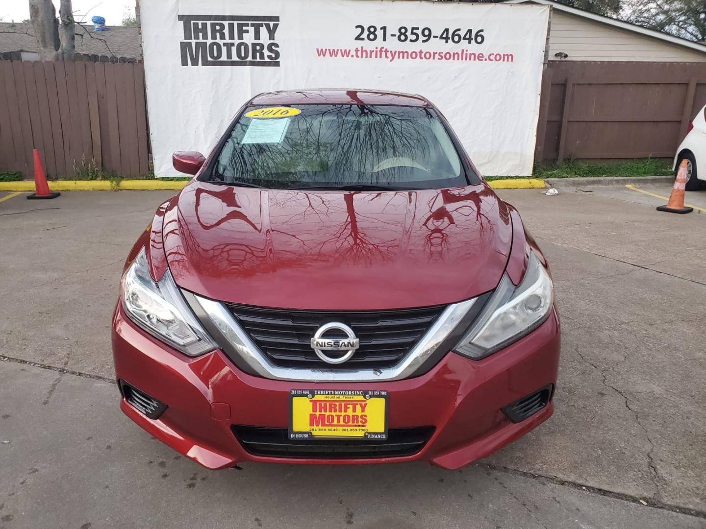 2016 Red Nissan Altima 2.5 SL (1N4AL3AP4GC) with an 2.5L L4 DOHC 16V engine, CVT transmission, located at 16710 Clay Rd., Houston, TX, 77084, (281) 859-7900, 29.834864, -95.656166 - Low Down. Low Payments. - Photo#1