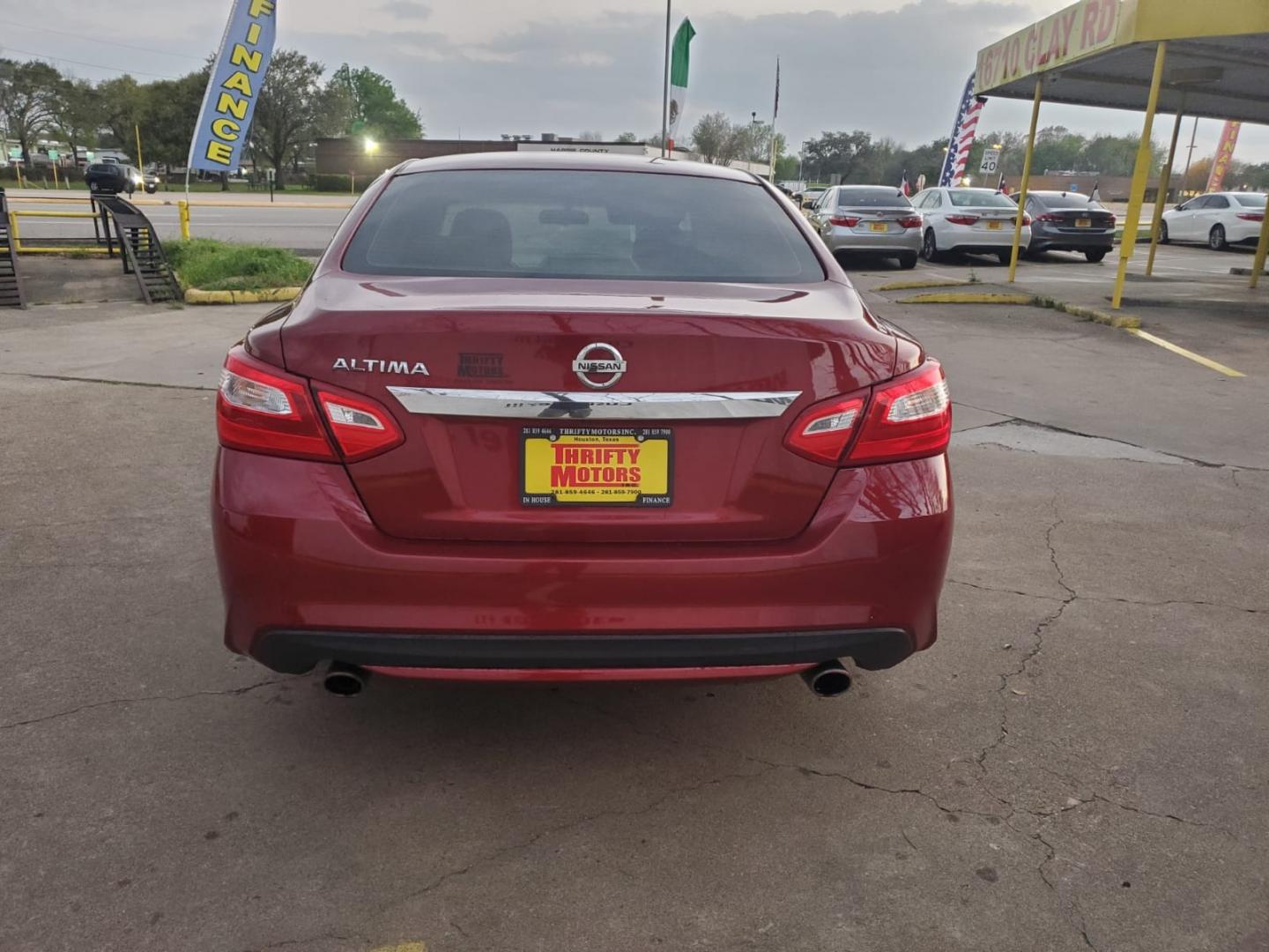 2016 Red Nissan Altima 2.5 SL (1N4AL3AP4GC) with an 2.5L L4 DOHC 16V engine, CVT transmission, located at 16710 Clay Rd., Houston, TX, 77084, (281) 859-7900, 29.834864, -95.656166 - Low Down. Low Payments. - Photo#5