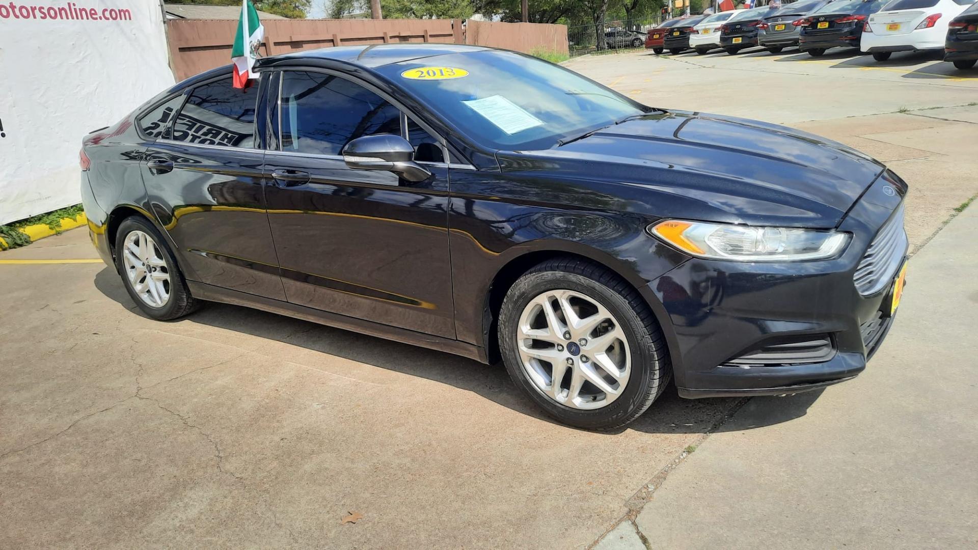 2013 Black Ford Fusion SE (3FA6P0HR7DR) with an 1.6L L4 DOHC 16V engine, located at 16710 Clay Rd., Houston, TX, 77084, (281) 859-7900, 29.834864, -95.656166 - LOW DOWN. LOW PAYMENTS. - Photo#3