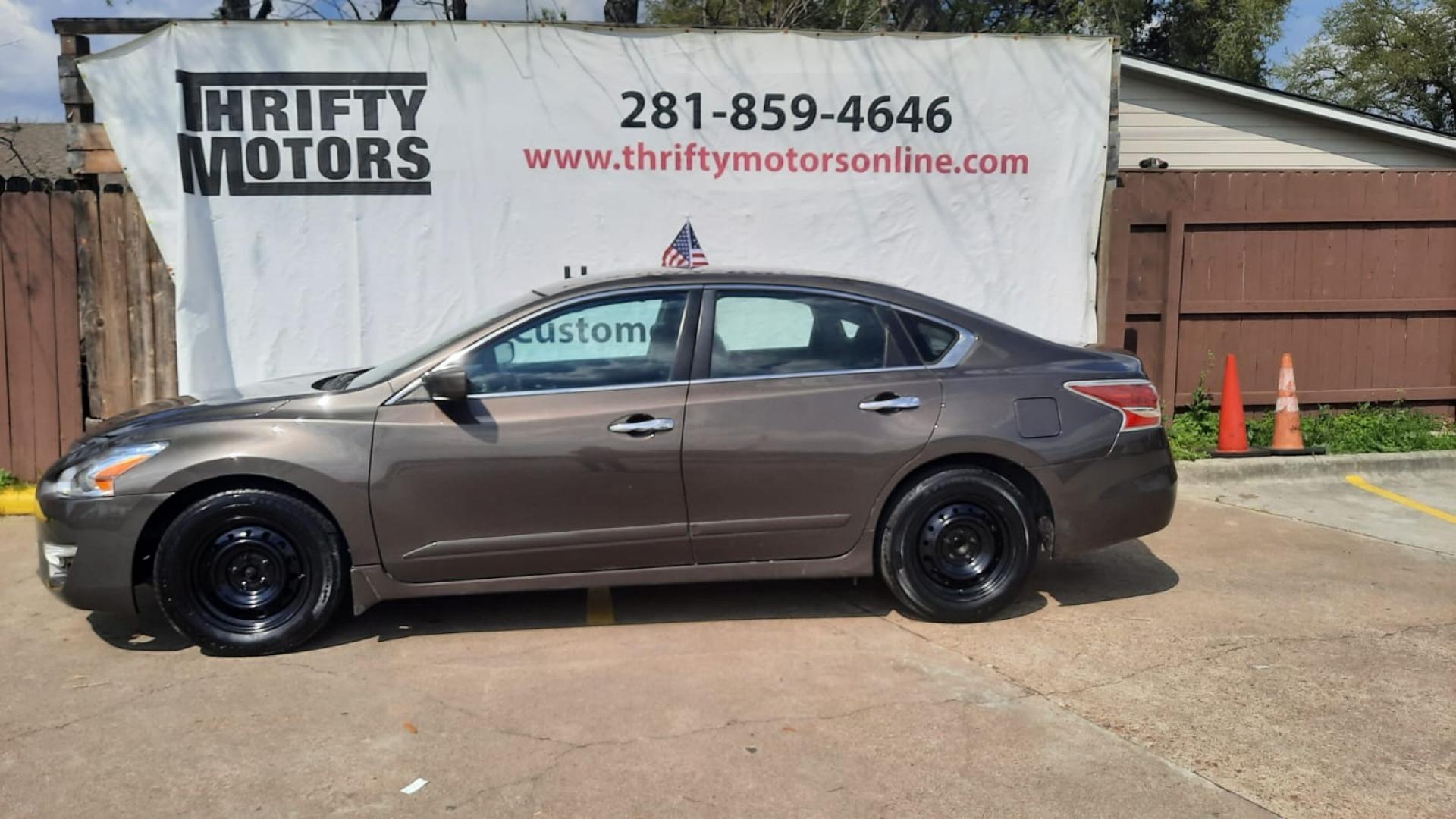 2014 Brown Nissan Altima 2.5 SL (1N4AL3AP9EN) with an 2.5L L4 DOHC 16V engine, Continuously Variable Transmission transmission, located at 16710 Clay Rd., Houston, TX, 77084, (281) 859-7900, 29.834864, -95.656166 - Low Down. Low Payments. - Photo#0