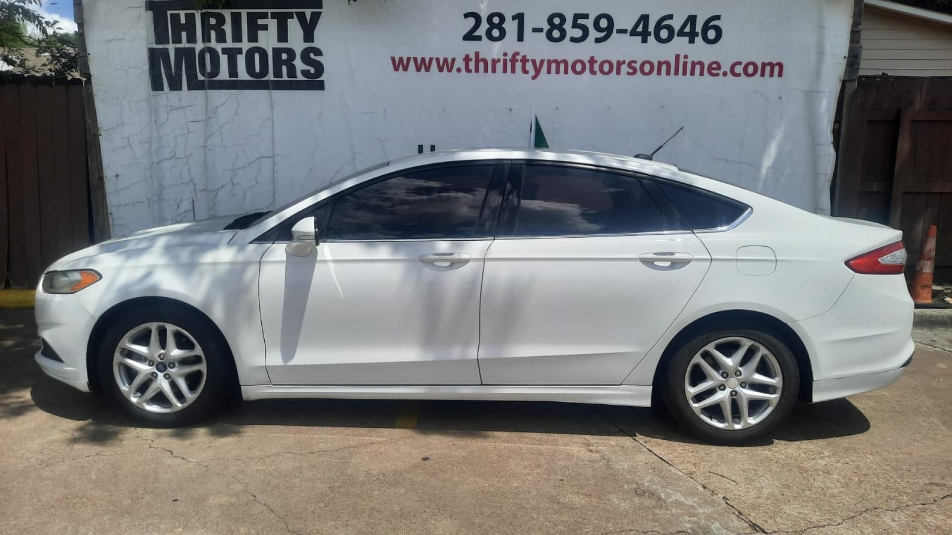 2015 Ford Fusion SE (3FA6P0H73FR) with an 2.5L L4 DOHC 16V engine, located at 16710 Clay Rd., Houston, TX, 77084, (281) 859-7900, 29.834864, -95.656166 - Photo#0