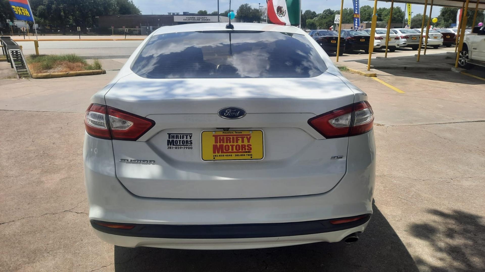 2015 Ford Fusion SE (3FA6P0H73FR) with an 2.5L L4 DOHC 16V engine, located at 16710 Clay Rd., Houston, TX, 77084, (281) 859-7900, 29.834864, -95.656166 - Photo#4