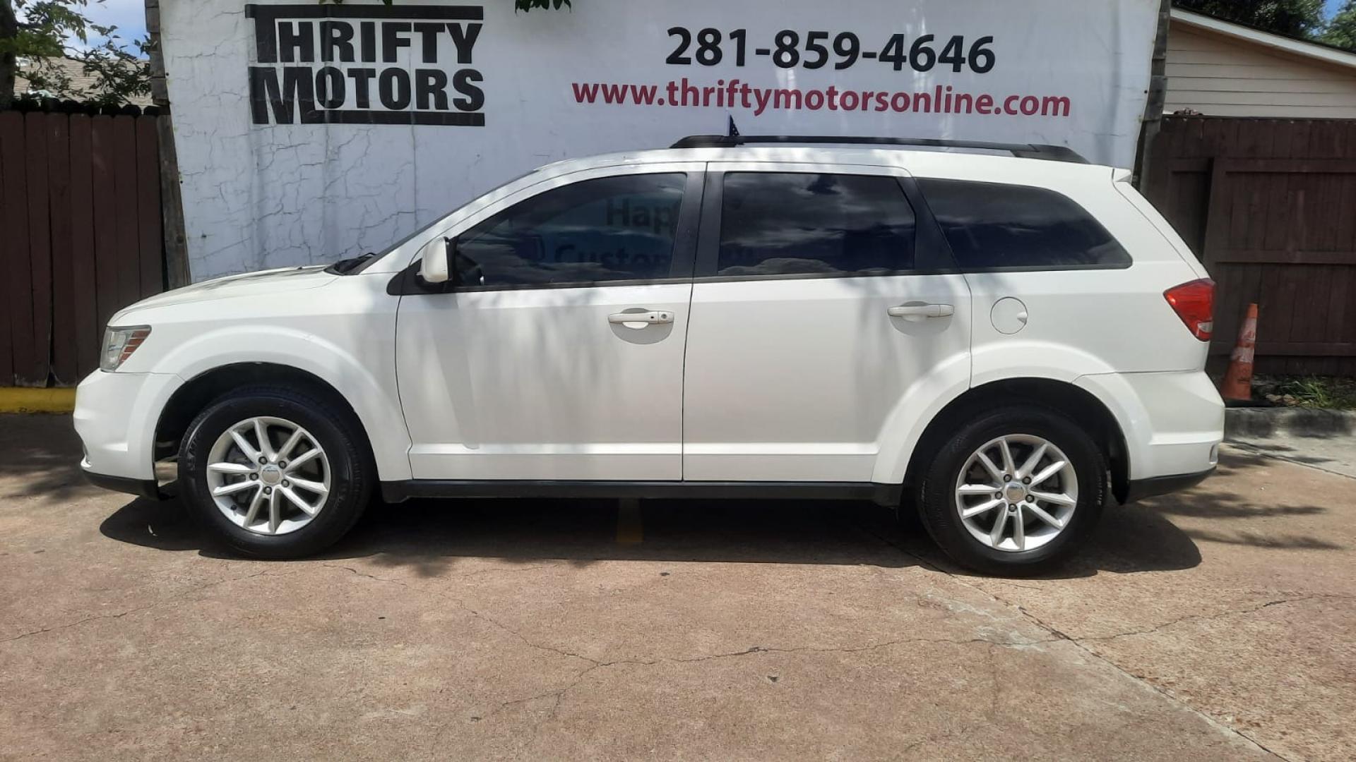 2016 Dodge Journey SXT (3C4PDCBB7GT) with an 2.4L L6 DOHC 16V engine, 4A transmission, located at 16710 Clay Rd., Houston, TX, 77084, (281) 859-7900, 29.834864, -95.656166 - Photo#9