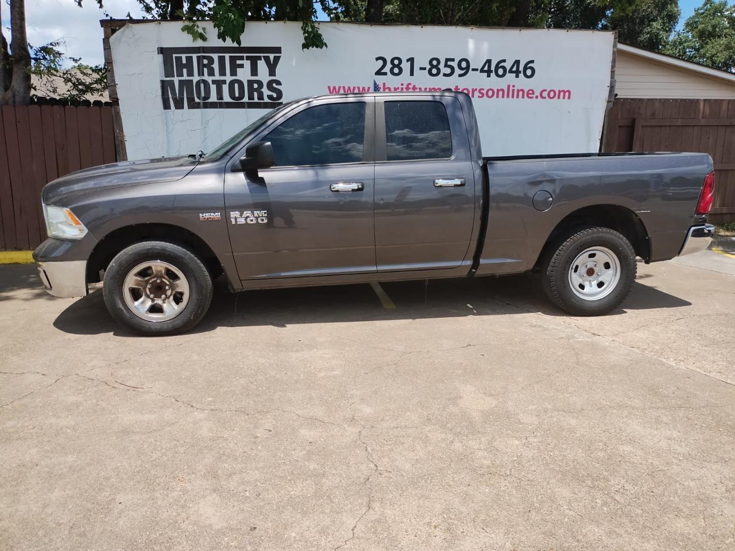 2015 RAM 1500 SLT Quad Cab 2WD (1C6RR6GT2FS) with an 5.7L V8 OHV 16V engine, 6-Speed Automatic transmission, located at 16710 Clay Rd., Houston, TX, 77084, (281) 859-7900, 29.834864, -95.656166 - Photo#1