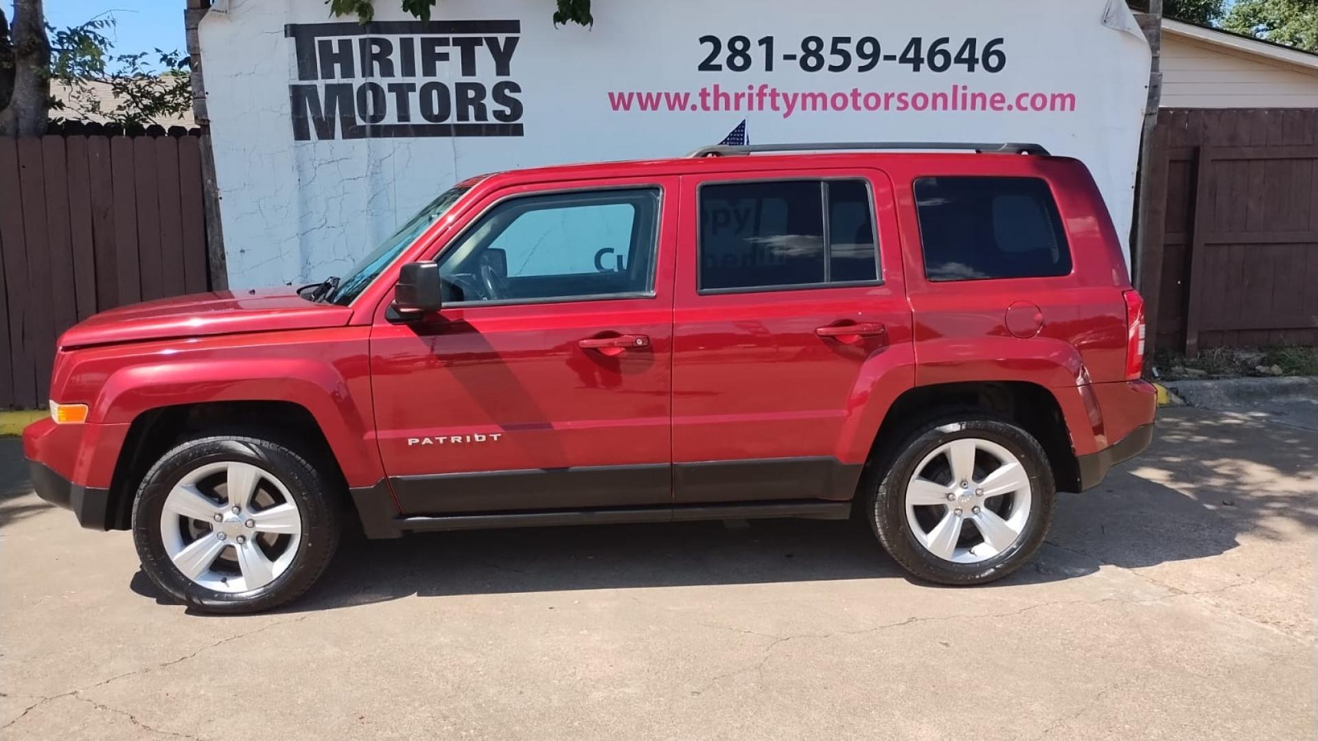 2014 Jeep Patriot Latitude 2WD (1C4NJPFB4ED) with an 2.4L L4 DOHC 16V engine, located at 16710 Clay Rd., Houston, TX, 77084, (281) 859-7900, 29.834864, -95.656166 - Photo#9