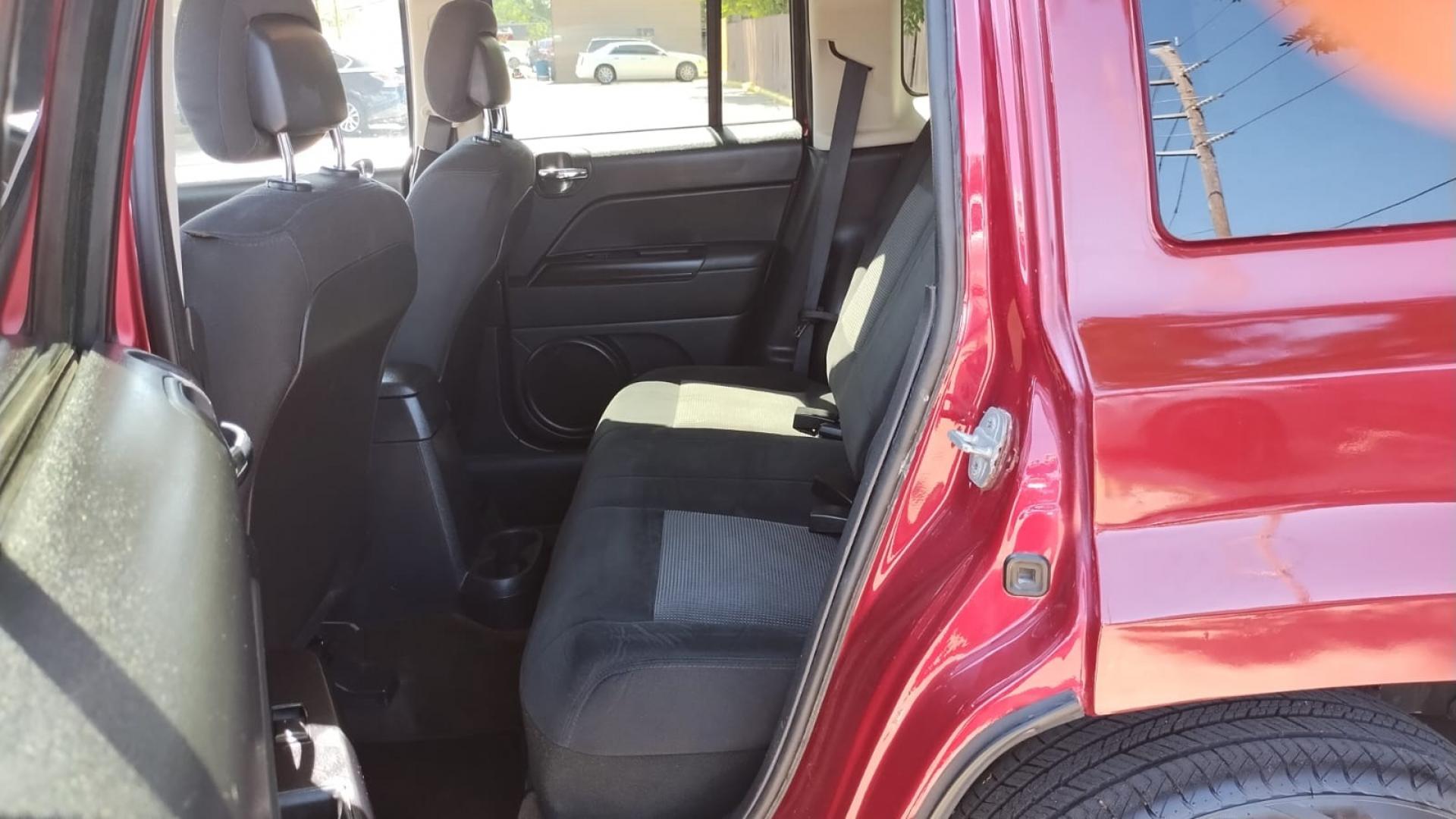 2014 Jeep Patriot Latitude 2WD (1C4NJPFB4ED) with an 2.4L L4 DOHC 16V engine, located at 16710 Clay Rd., Houston, TX, 77084, (281) 859-7900, 29.834864, -95.656166 - Photo#3