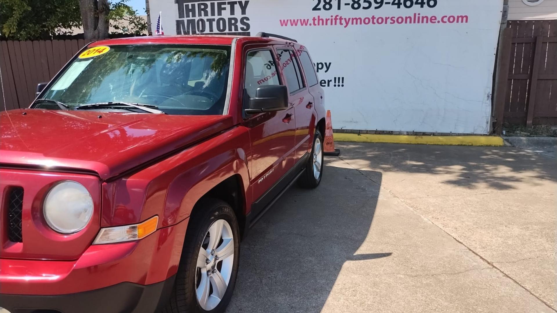 2014 Jeep Patriot Latitude 2WD (1C4NJPFB4ED) with an 2.4L L4 DOHC 16V engine, located at 16710 Clay Rd., Houston, TX, 77084, (281) 859-7900, 29.834864, -95.656166 - Photo#6