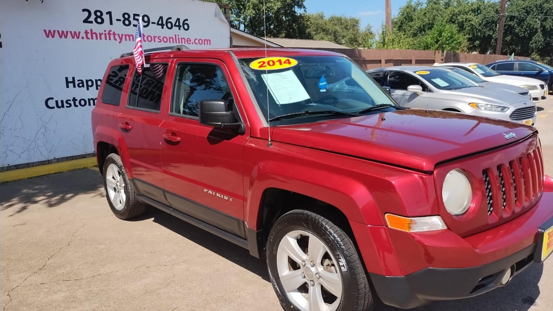 2014 Jeep Patriot Latitude 2WD (1C4NJPFB4ED) with an 2.4L L4 DOHC 16V engine, located at 16710 Clay Rd., Houston, TX, 77084, (281) 859-7900, 29.834864, -95.656166 - Photo#7