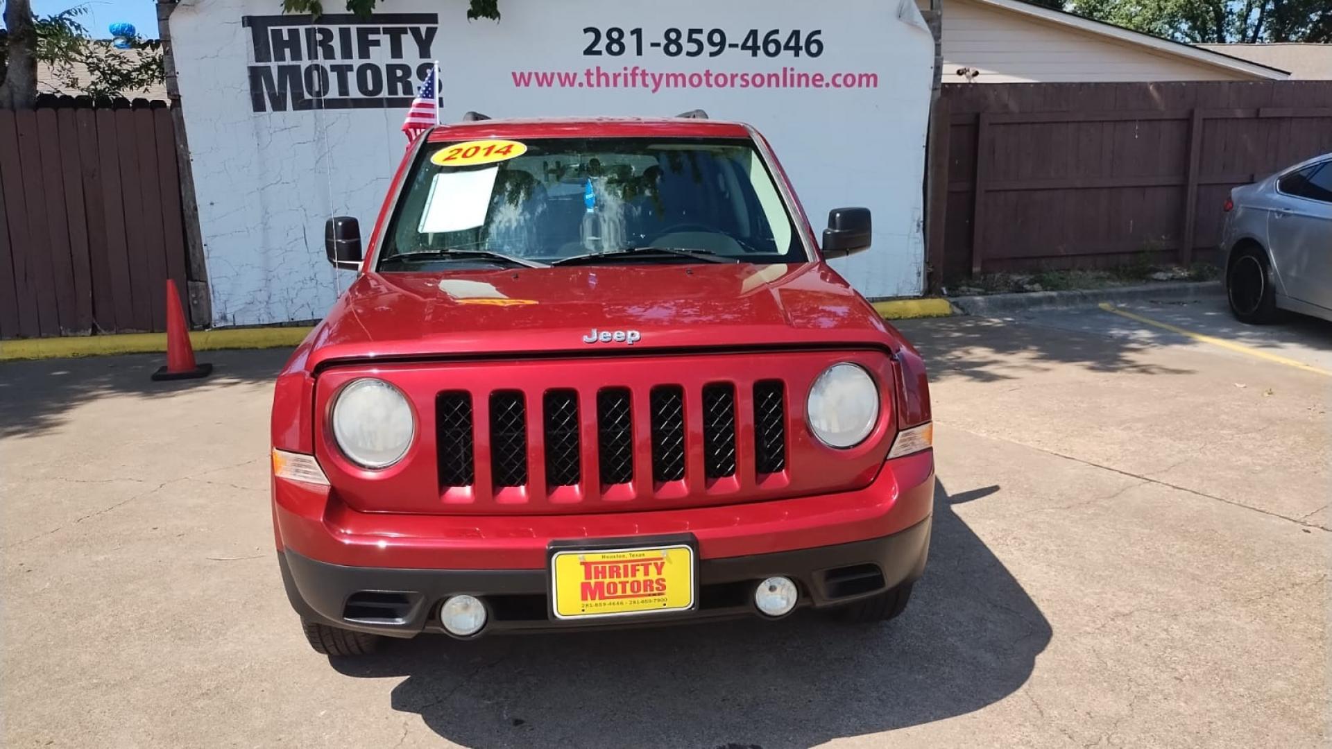 2014 Jeep Patriot Latitude 2WD (1C4NJPFB4ED) with an 2.4L L4 DOHC 16V engine, located at 16710 Clay Rd., Houston, TX, 77084, (281) 859-7900, 29.834864, -95.656166 - Photo#8