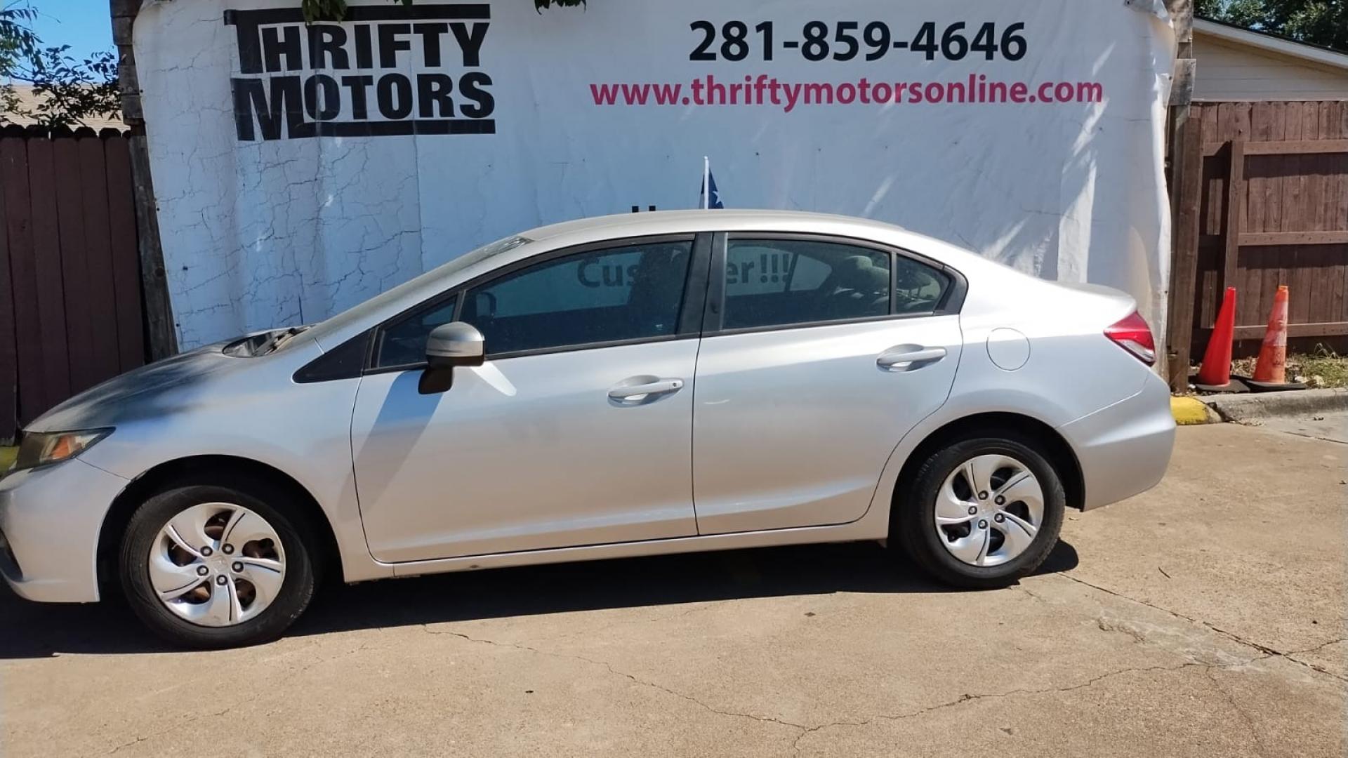 2014 Honda Civic LX Sedan CVT (19XFB2F52EE) with an 1.8L L4 SOHC 16V engine, Continuously Variable Transmission transmission, located at 16710 Clay Rd., Houston, TX, 77084, (281) 859-7900, 29.834864, -95.656166 - Photo#8