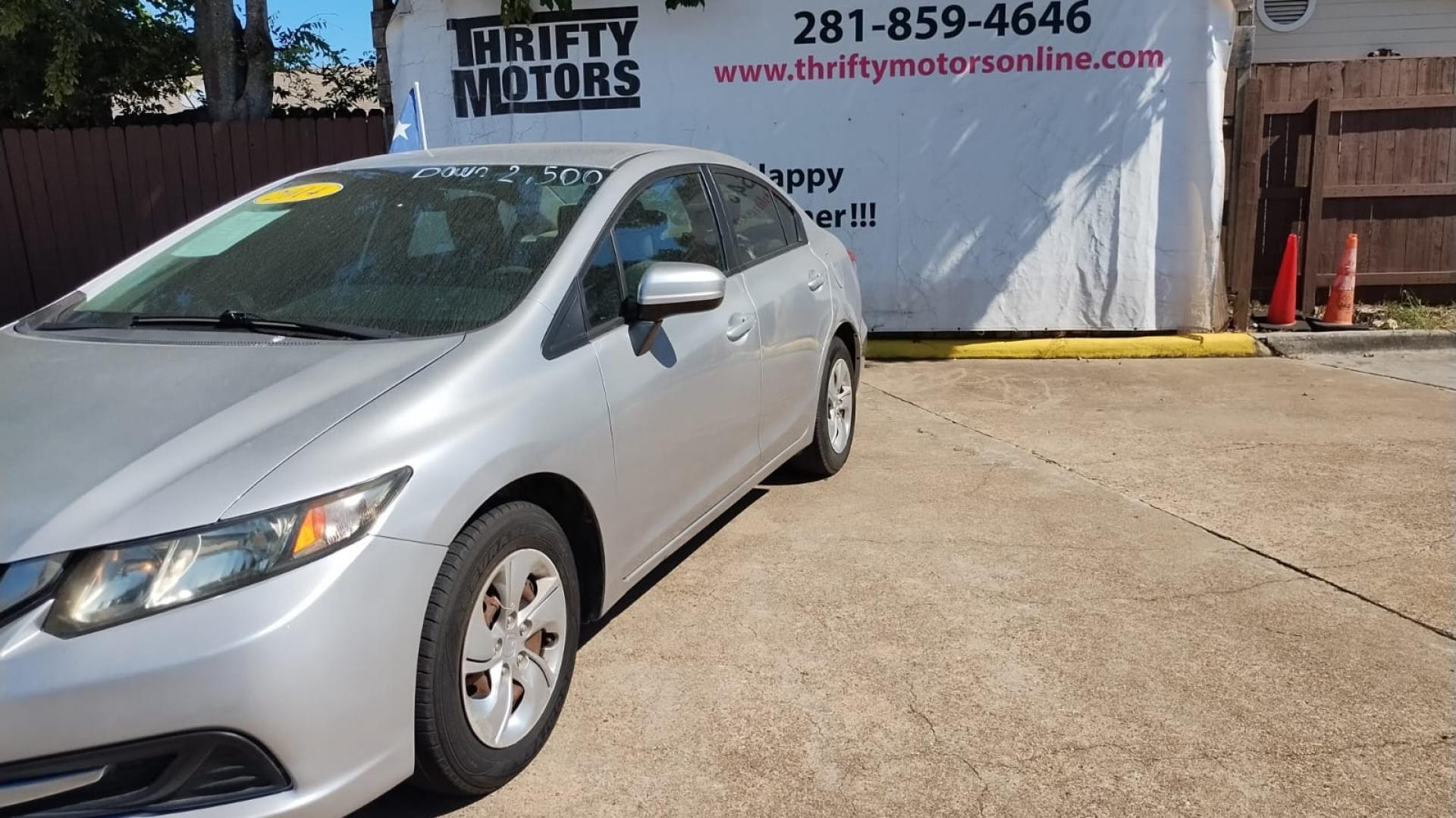 2014 Honda Civic LX Sedan CVT (19XFB2F52EE) with an 1.8L L4 SOHC 16V engine, Continuously Variable Transmission transmission, located at 16710 Clay Rd., Houston, TX, 77084, (281) 859-7900, 29.834864, -95.656166 - Photo#5