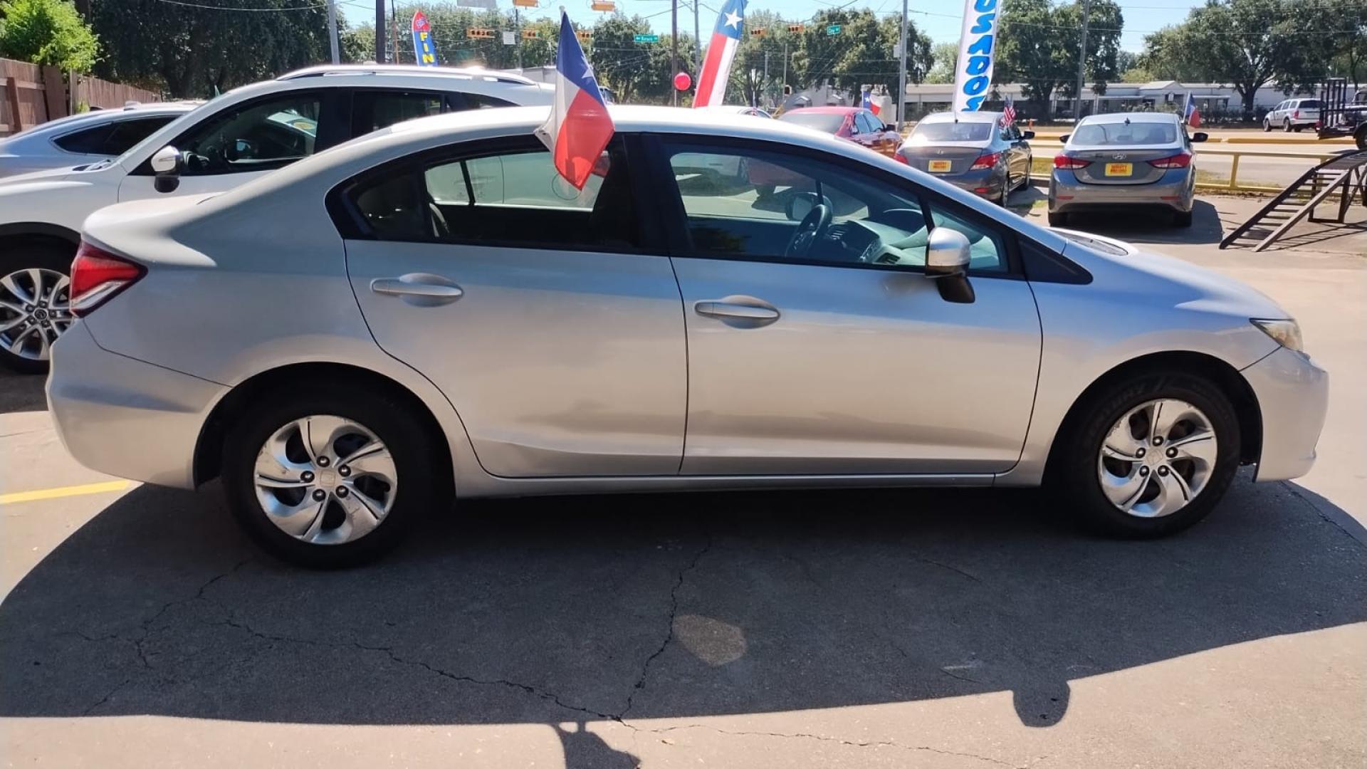 2014 Honda Civic LX Sedan CVT (19XFB2F52EE) with an 1.8L L4 SOHC 16V engine, Continuously Variable Transmission transmission, located at 16710 Clay Rd., Houston, TX, 77084, (281) 859-7900, 29.834864, -95.656166 - Photo#7