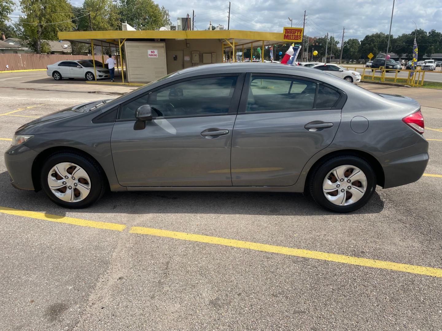 2013 Honda Civic LX Sedan 5-Speed AT (2HGFB2F54DH) with an 1.8L L4 SOHC 16V engine, 5-Speed Automatic transmission, located at 16710 Clay Rd., Houston, TX, 77084, (281) 859-7900, 29.834864, -95.656166 - Photo#5