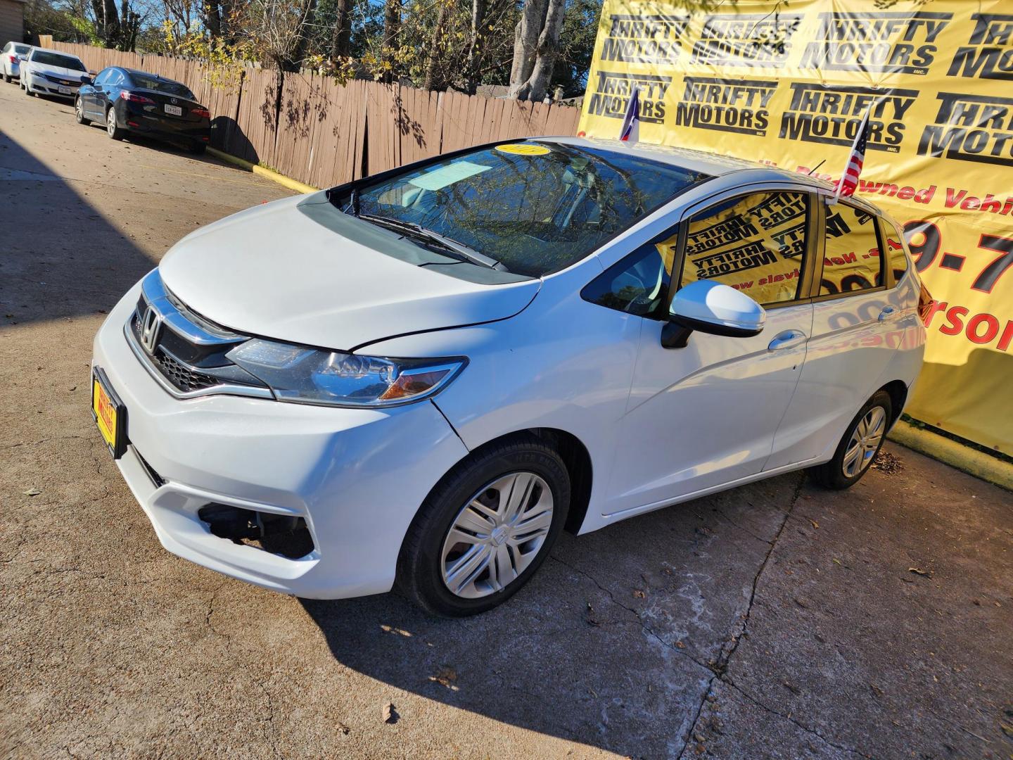 2019 White /Gray Honda Fit LX CVT (3HGGK5H47KM) with an 1.5L L4 SOHC 16V engine, CVT transmission, located at 16710 Clay Rd., Houston, TX, 77084, (281) 859-7900, 29.834864, -95.656166 - Photo#1