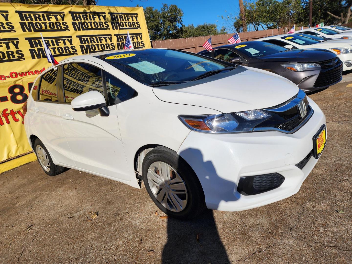 2019 White /Gray Honda Fit LX CVT (3HGGK5H47KM) with an 1.5L L4 SOHC 16V engine, CVT transmission, located at 16710 Clay Rd., Houston, TX, 77084, (281) 859-7900, 29.834864, -95.656166 - Photo#2