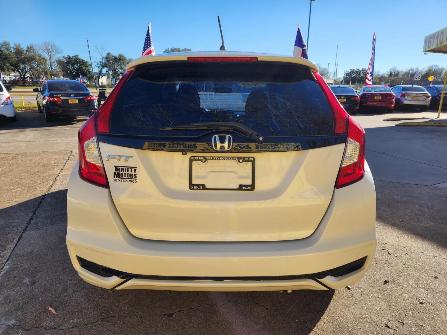 2019 White /Gray Honda Fit LX CVT (3HGGK5H47KM) with an 1.5L L4 SOHC 16V engine, CVT transmission, located at 16710 Clay Rd., Houston, TX, 77084, (281) 859-7900, 29.834864, -95.656166 - Photo#5