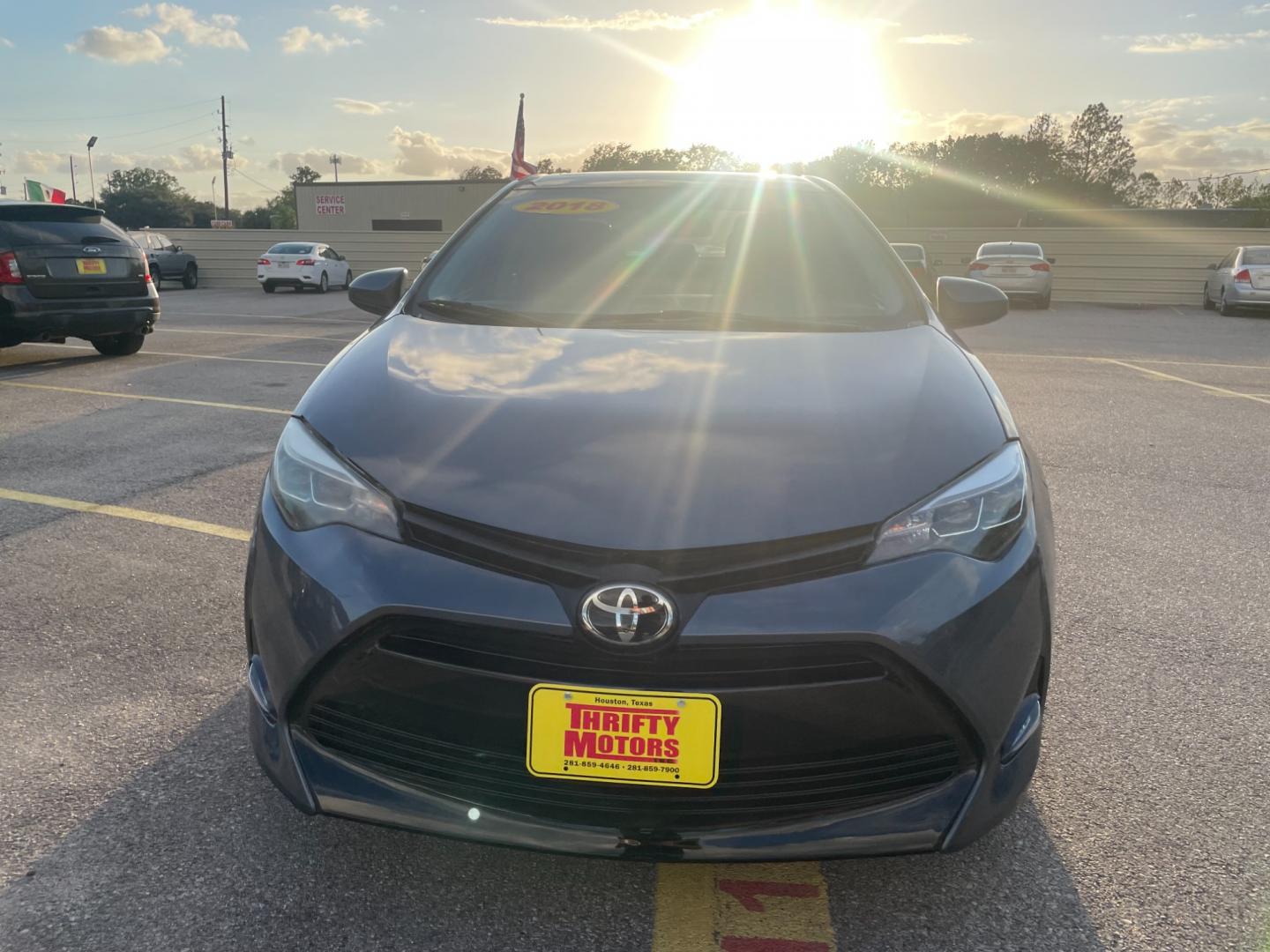 2018 Toyota Corolla XLE CVT (2T1BURHEXJC) with an 1.8L L4 DOHC 16V engine, CVT transmission, located at 16710 Clay Rd., Houston, TX, 77084, (281) 859-7900, 29.834864, -95.656166 - Photo#4