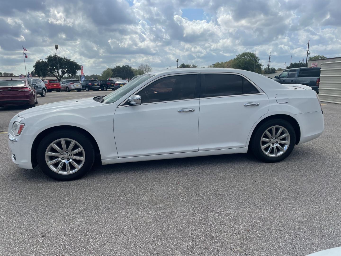 2011 Chrysler 300 Limited RWD (2C3CA5CG6BH) with an 3.6L V6 SOHC 24V engine, 5-Speed Automatic transmission, located at 16710 Clay Rd., Houston, TX, 77084, (281) 859-7900, 29.834864, -95.656166 - Photo#1